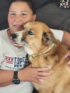 Pet sitter Michelle with a happy dog